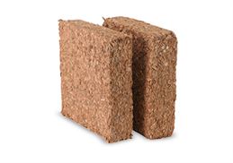 High-quality image of a coco chips block, a durable product manufactured by Almighty Coir for horticultural needs.
